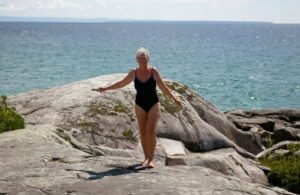 Woman in a bathing suit being caught on camera.